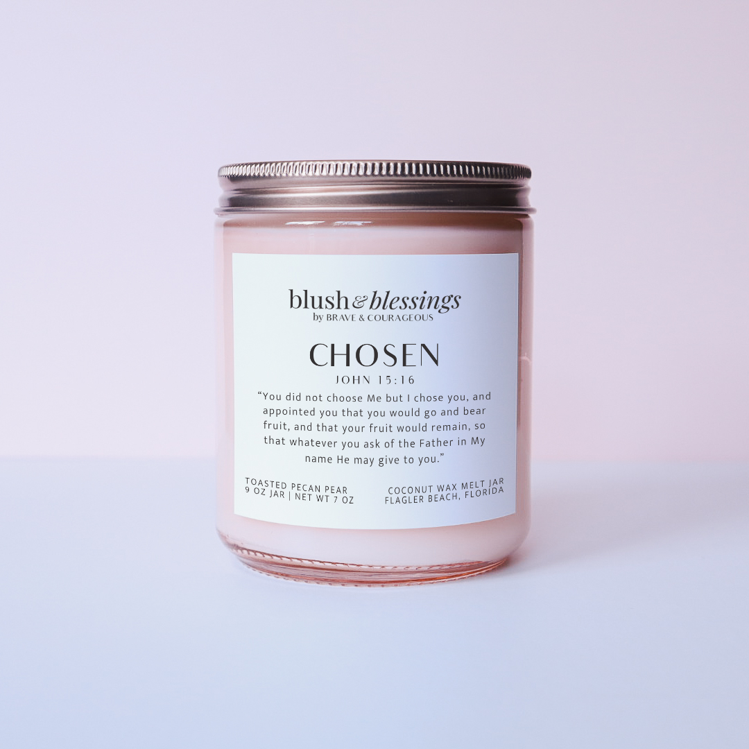 Blush Wax melt jar with a while label that says "Chosen" with John 15:16 on it. Complete with a copper metal lid on a pinkish purple backdrop.
